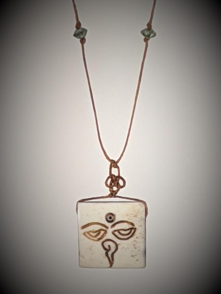 Carved Bone Buddhas Eyes Triquetra Knot Necklace picture
