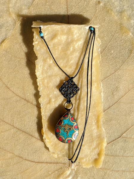 Tibetan Metal Work Inlay Buddhas Eyes with Turquoise and Coral Celtic Knot Necklace picture