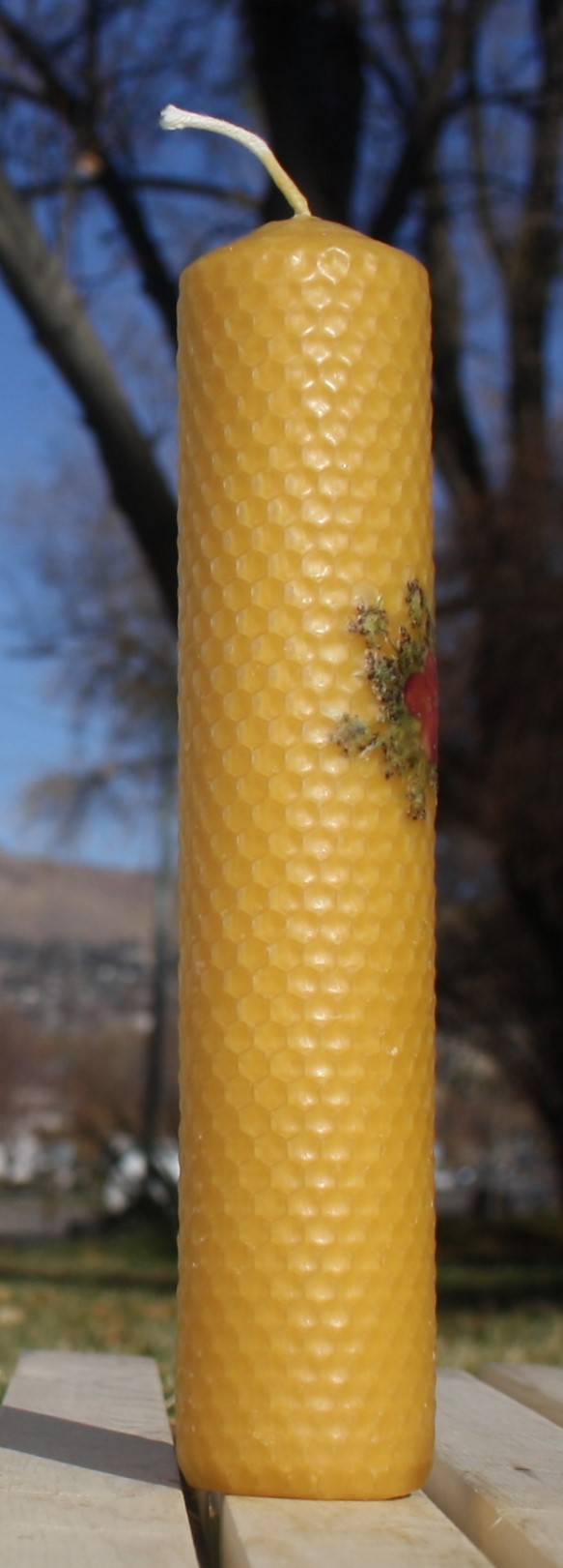 Beeswax candle with pressed flowers tall pillar picture