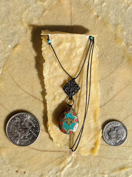 Tibetan Metal Work Inlay Buddhas Eyes with Turquoise and Coral Celtic Knot Necklace picture