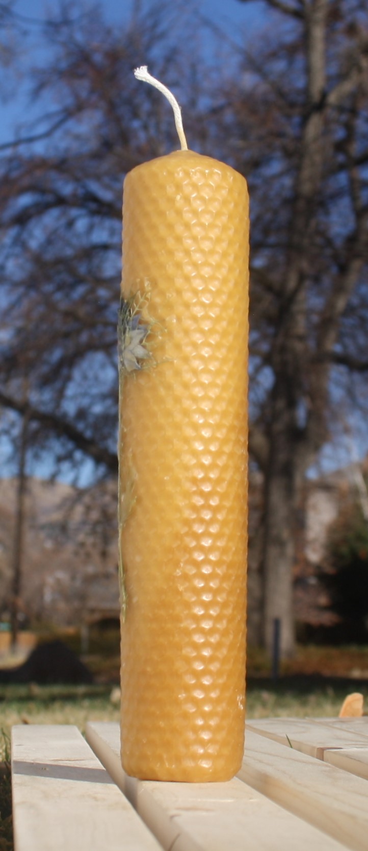 Beeswax candle with pressed flowers tall pillar picture