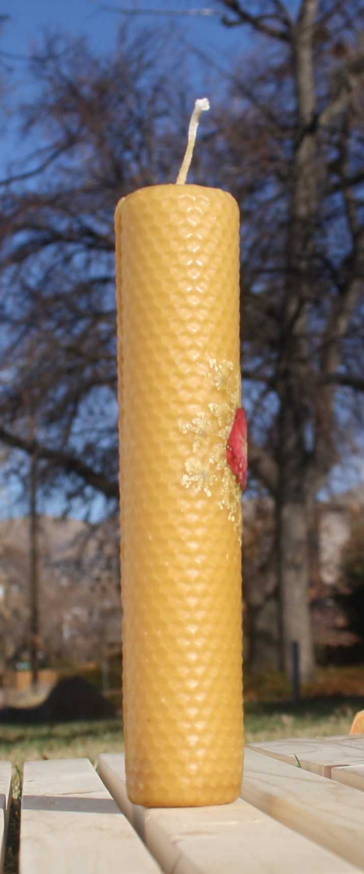 Beeswax candle with pressed flowers tall pillar picture
