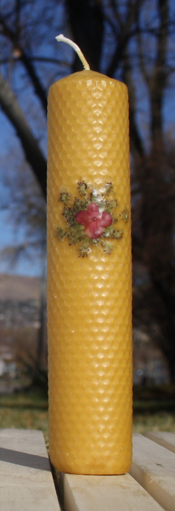 Beeswax candle with pressed flowers tall pillar picture