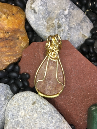 Sunstone Wire Wrapped in Yellow Brass Pendant - Jewelry with Meaning - Luck and Good Fortune picture