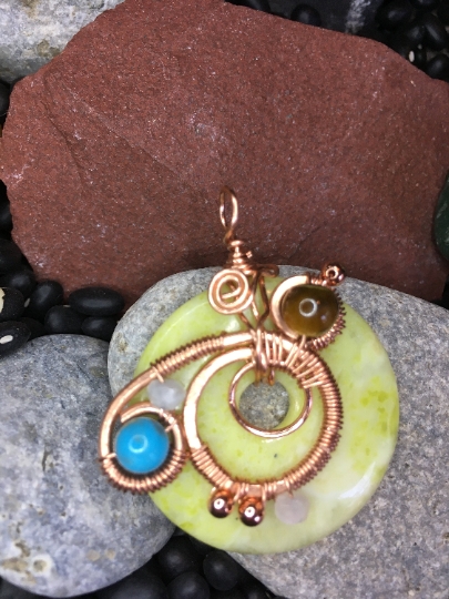 Yellow Serpentine Donut Pendant with Copper Free Form Wire Artwork and Stone Accents - Jewelry with Purpose