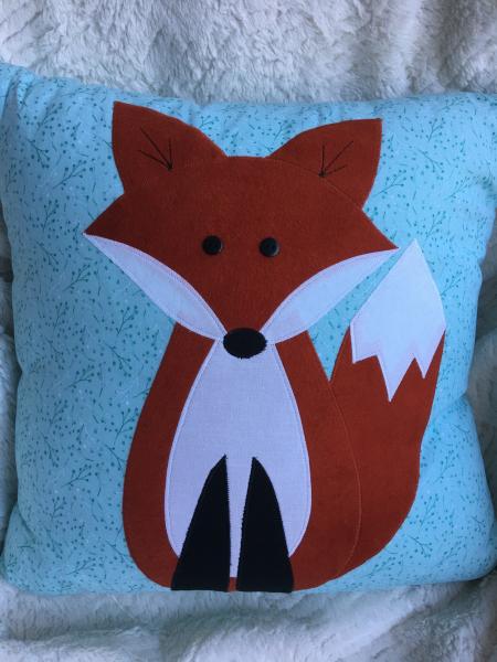 Fox appliqué pillow on mint subtle pattern background picture