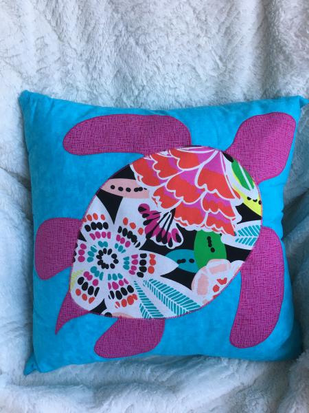 Floral sea turtle applique on turquoise pillow picture