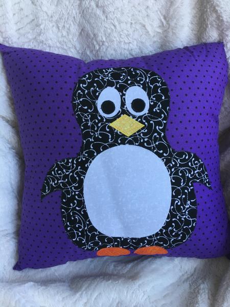 Penguin on purple/black dot pillow