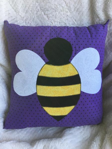 Bumblebee appliqué on purple with black dot pillow