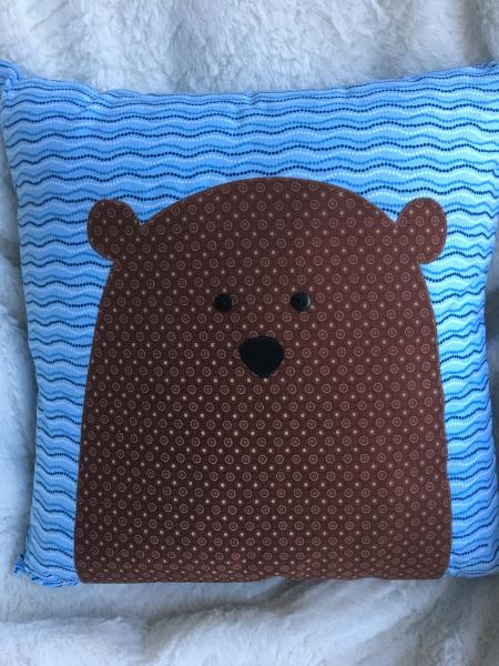 Brown bear appliqué pillow