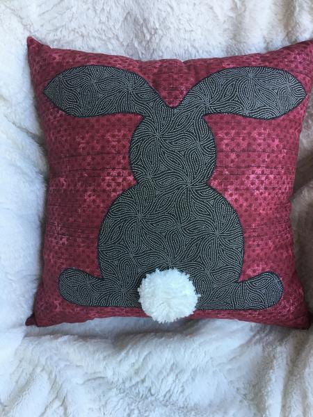 Rabbit appliqué on burgundy pillow picture