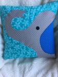 Grey elephant on turquoise floral background pillow