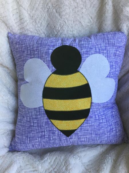 Bumblebee appliqué on purple/white pillow picture