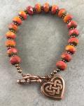 Red Orange Czech Glass Bracelet with Celtic Heart Charm