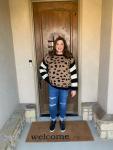 Leopard sweater with striped sleeves