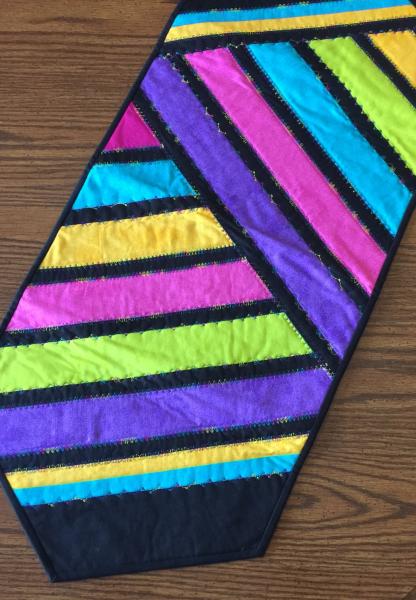 Small bright colored striped table runner