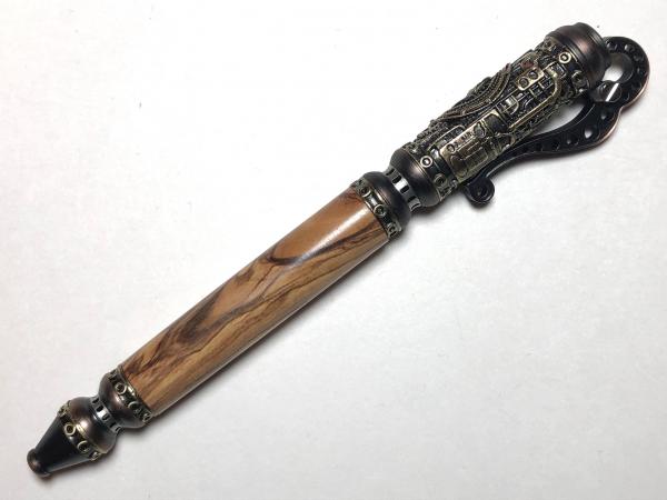 Steampunk steampump pen made with various woods, acrylic.