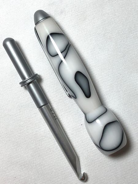 Crochet hooks, made with various acrylics.
