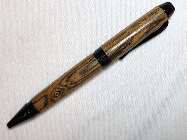 Cigar pens made with various woods and acrylics, twist pens.