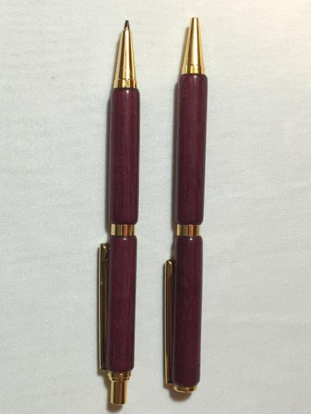 Various 2 piece pen and pencil sets .