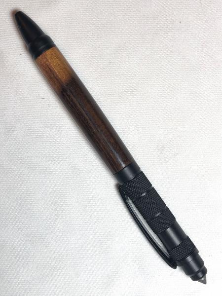 Tactical pen made with various woods, acrylic.