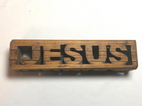 Jesus 2 sided scroll saw cut from pine.