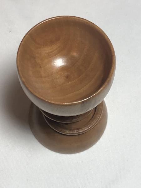 Captive ring goblet with interlocking rings.