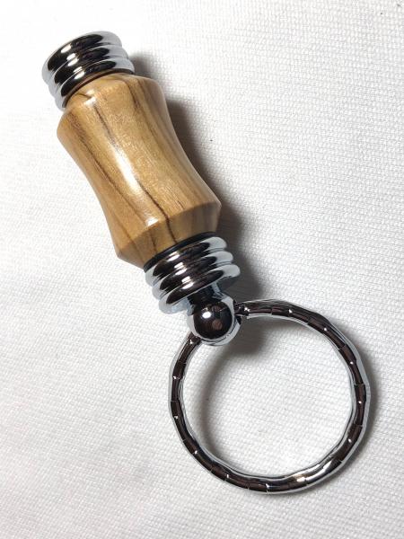 Stubby Secret compartment keychains, made with various woods or acrylics.