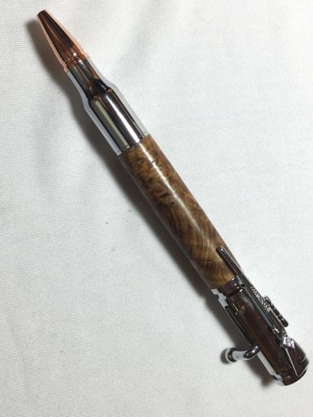 Bolt action .30 caliber pen made with various woods and hardware colors.