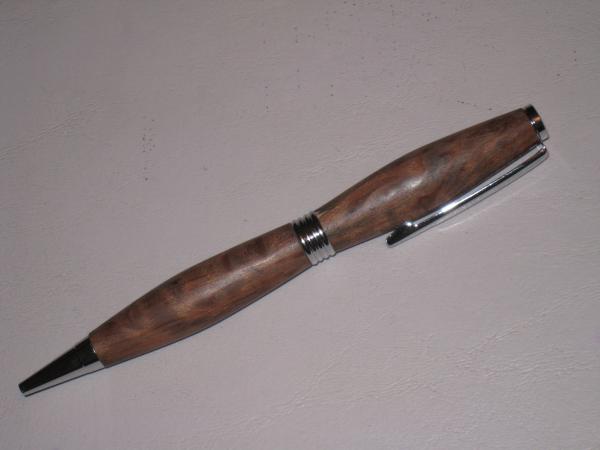 Saturn style pen made with various woods.