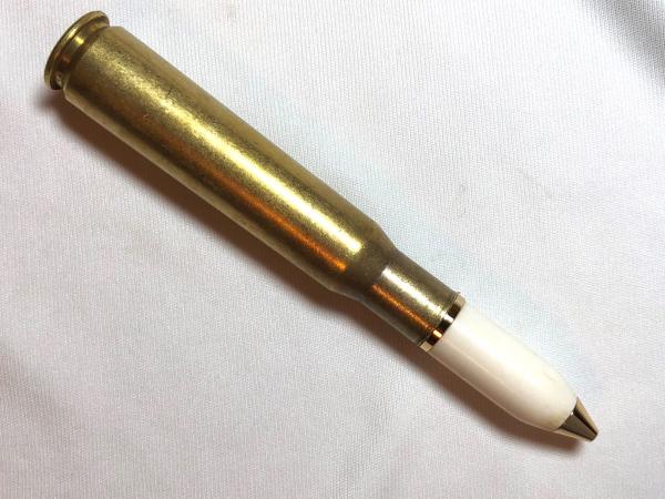 50 caliber machine gun bullet pen made with deer antler, gold hardware, and a genuine casing