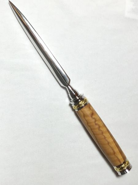 Letter openers in gold or black titanium and Rhodium hardware.