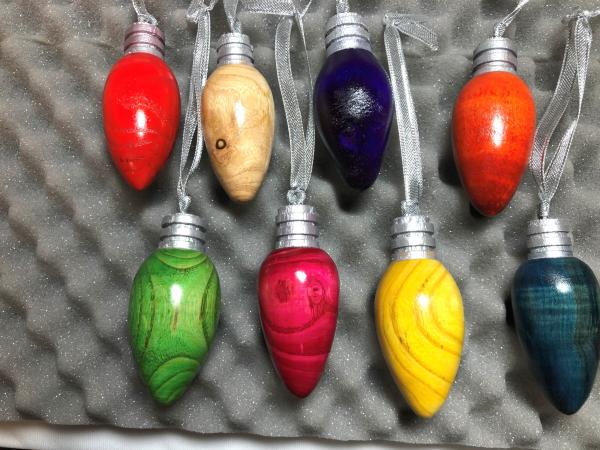 Set of 8 turned light bulb Christmas ornaments.
