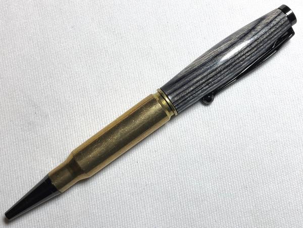 308 caliber bullet pen made with gray colorwood and a genuine casing