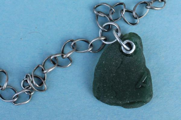 N502 Riveted Green Beach Glass picture