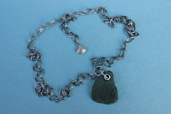 N502 Riveted Green Beach Glass picture