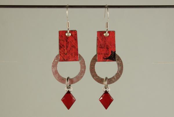 E426 Riveted Tin Loops & Red Crystal picture