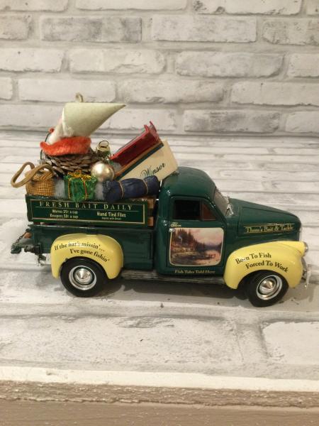 Fishing truck filled with vintage and antique decorations picture