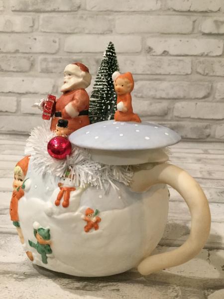 Vintage tea pot with antique ornaments picture