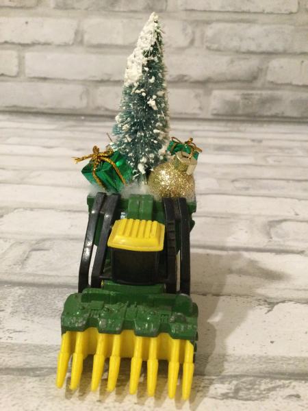 Vintage Johns Deere combine with vintage Christmas decorations picture