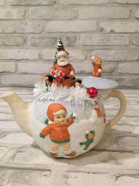 Vintage tea pot with antique ornaments picture