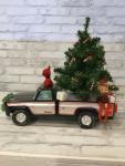 Vintage Pronto truck filled with antique Christmas decorations