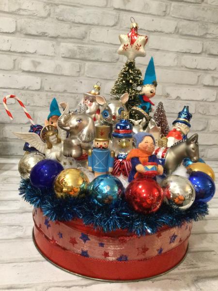 Antique red tin filled with antique Christmas decorations and ornaments picture