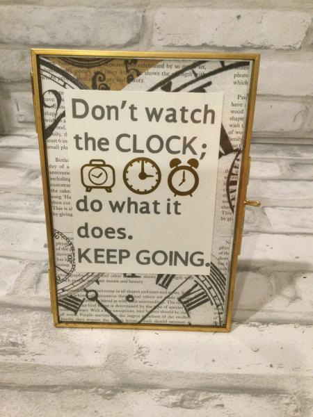 Gold framed homemade saying. picture