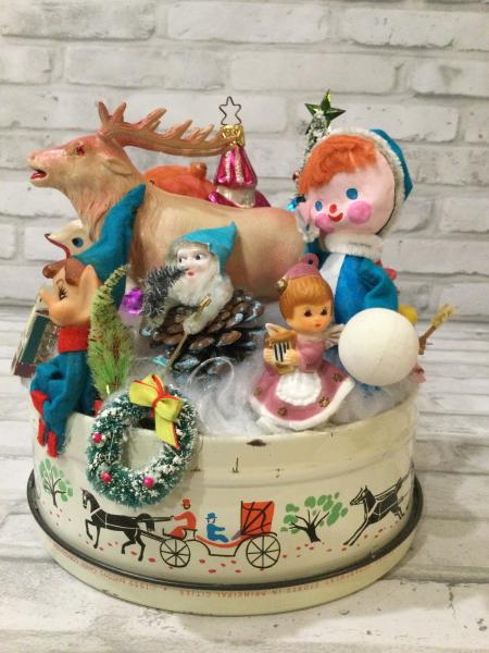 Vintage Retro Christmas tin filled with antique Christmas decorations and ornaments