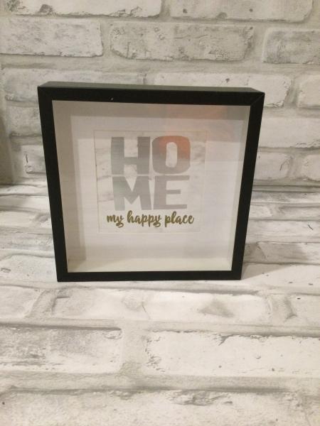 Black framed sayin that says, HOME my happy place