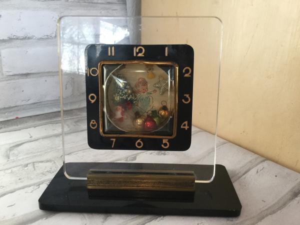 Antique black and gold clock picture