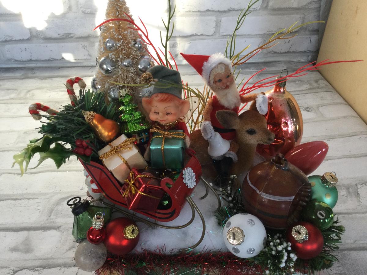 Vintage Christmas tin filled with vintage Christmas decorations picture