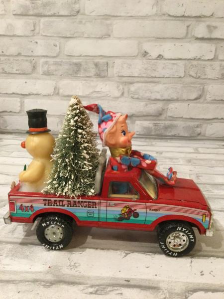 Red Nylint trail ranger truck with antique decorations picture