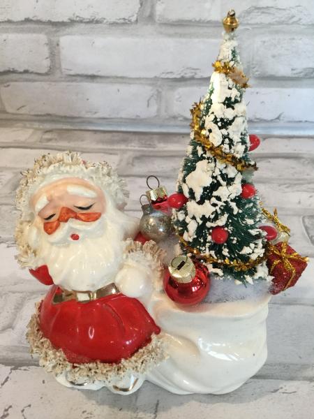 Antique Santa with gift bag